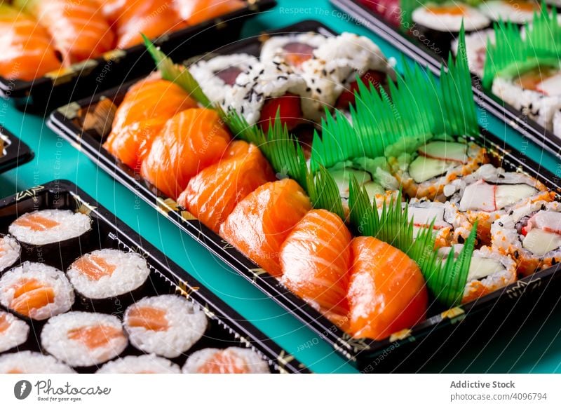 Tasty sushi served in a table rolled up Sushi Plate above asia asian background chopstick fish food fresh gourmet healthy japan japanese japanese sushi