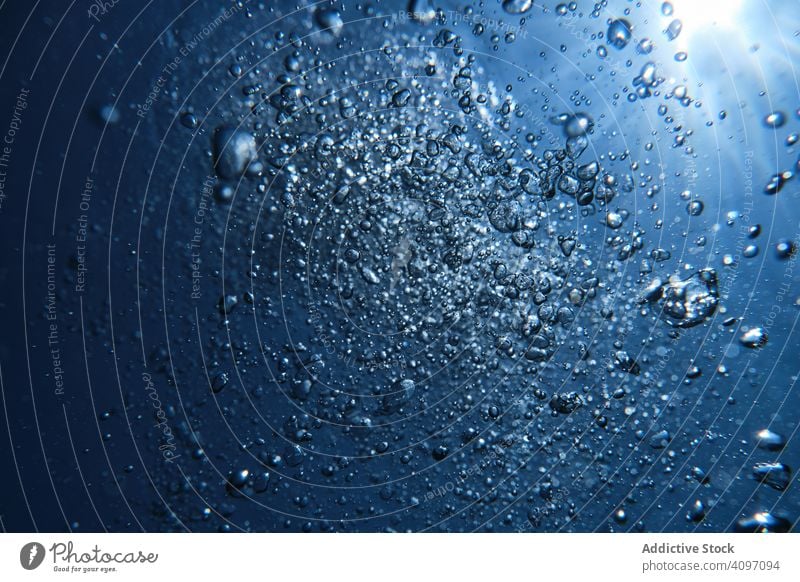 Popping up air bubbles in sea water background clear underwater clean oxygen purity breathe smooth motion fresh surface ocean transparent drop submerged dive