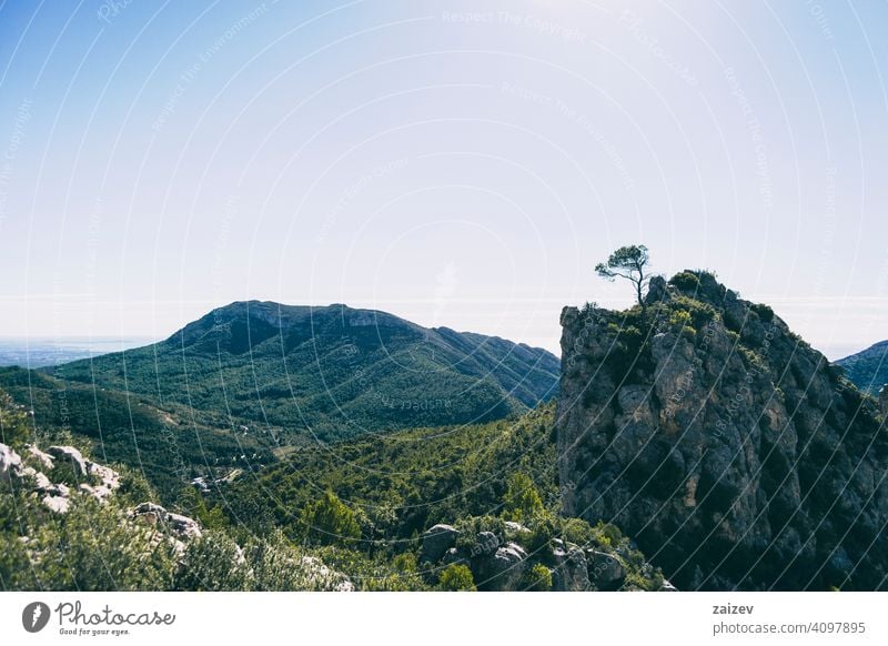 view from the top of a mountain in catalonia. eroded layered canyon nature outdoors travel destinations spain tarragona descent moment moody ascend haze huge