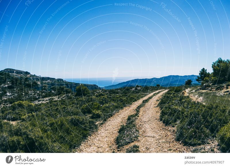 view from the top of a mountain in catalonia. eroded layered canyon nature outdoors travel destinations spain tarragona descent moment moody ascend haze huge