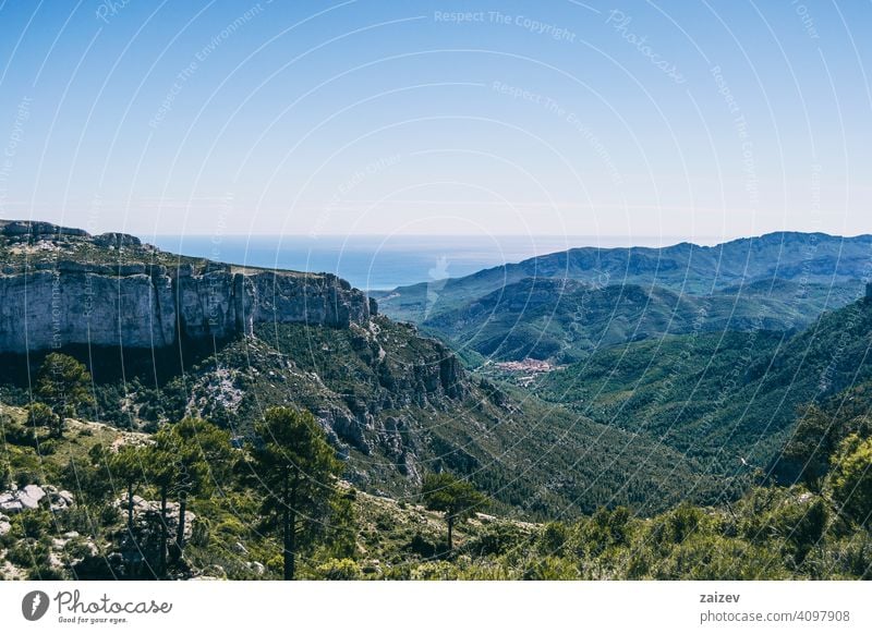 view from the top of a mountain in catalonia. eroded layered canyon nature outdoors travel destinations spain tarragona descent moment moody ascend haze huge