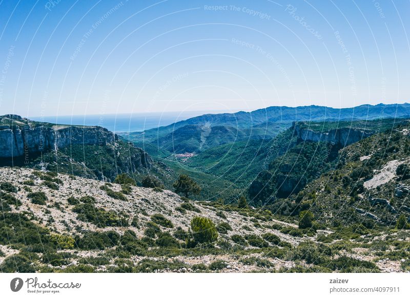 view from the top of a mountain in catalonia. eroded layered canyon nature outdoors travel destinations spain tarragona descent moment moody ascend haze huge