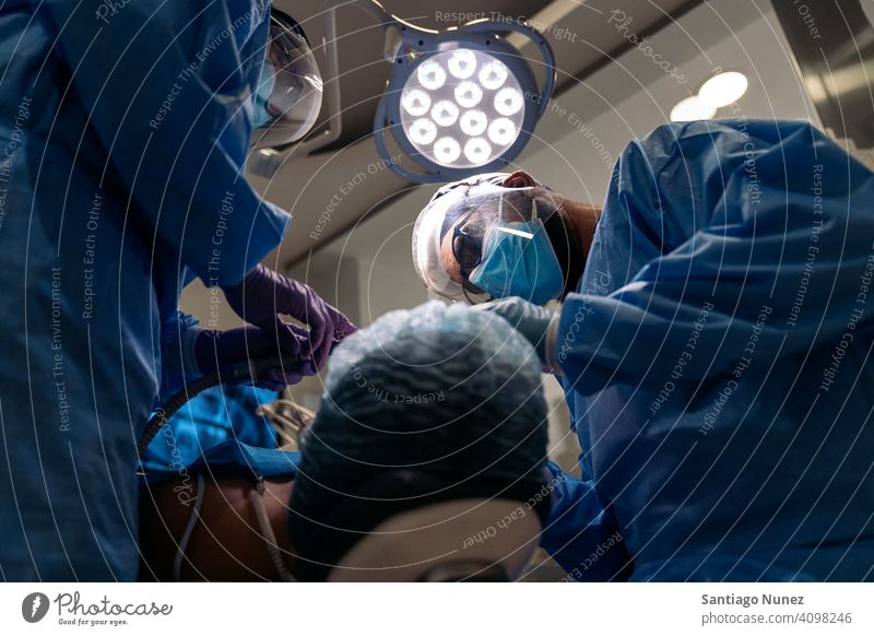 Dental Clinic Workers Bottom View man patient standing looking examining dentist clinic dental clinic lying health care equipment medicine medical treatment