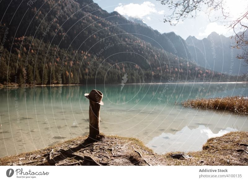 Lake near mountains lake house stilts wooden reflection nature travel water landscape sky scenery hat view tourism vacation clouds holiday adventure journey