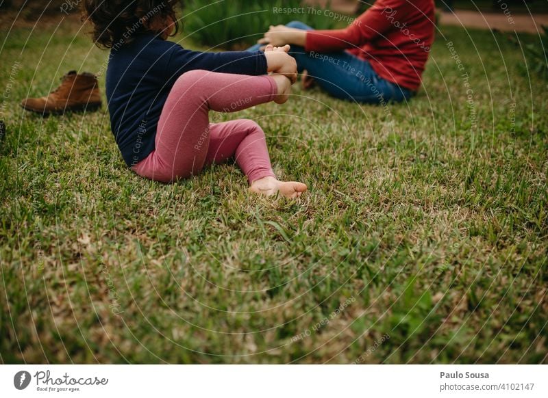 Child barefoot on the grass Girl 1 - 3 years Caucasian Barefoot Grass Spring Feet Cute Meadow Summer Colour photo Human being Infancy 3 - 8 years Exterior shot