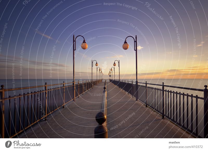 career Landscape Sky Clouds Horizon Sunrise Sunset Weather Beautiful weather Coast Ocean Deserted Blue Yellow Gold Gray Sea bridge Jetty Banister