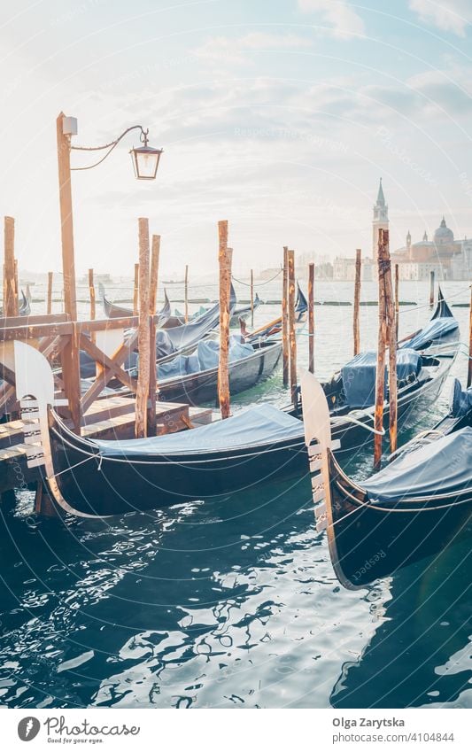 Gondolas in morning light. gondola sunrise pastel mood blue water boat canal italian sunlight italy romantic venezia venice city historic venetian view europe