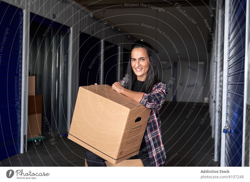 Woman with cardboard boxes woman package pretty delivery beautiful lifestyle holding opening receive packaging happy female container post parcel postal