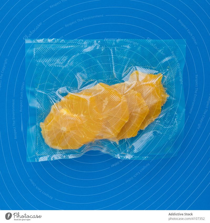 Orange in plastic bag fruit orange vacuum food keep conservation preserve peeled package ripe healthy fresh sweet natural wellness vitality vitamin nutrition