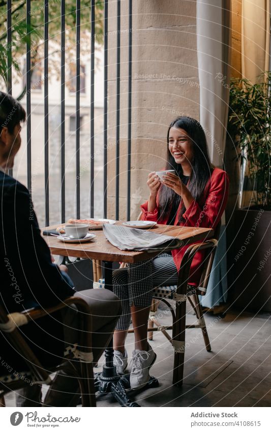 Couple having breakfast in cafe couple coffee meeting casual calm relax young drink modern together communicate beverage cafeteria talk elegant conversation