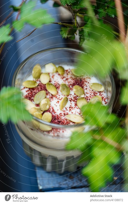 Delicious dessert with seeds in cup creamy sweet cinnamon glass delicious fresh ice cream yummy gourmet sugar ingredient festive confectionery calorie milk