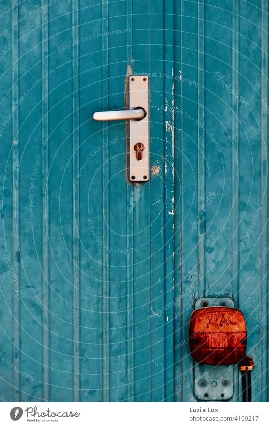 Construction car door blue and orange, luminous Container Site trailer Blue Orange Rear light Old Sunlight Colour photo Exterior shot Rust Decline Day