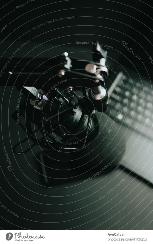 Close up mock up of a streaming microphone with a laptop with copy space, technology streaming, space work at home mockup minimal pink blue streamers copy-space