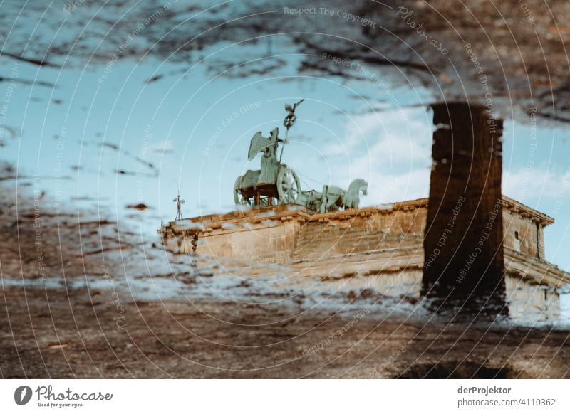 Brandenburg Gate in the reflection of a puddle X Central perspective Reflection Shadow Copy Space top Twilight Artificial light Light Copy Space right