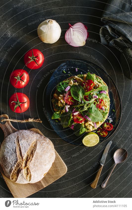 Cooking ingredients near fresh salad guacamole cuisine cook organic avocado vegetable bread food kitchen composition meal healthy tasty yummy delicious tomato