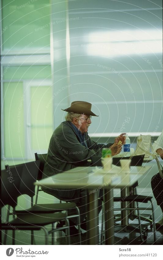 airport cowboy Cowboy Artificial light Loneliness Senior citizen Human being Airport Male senior Hat Nutrition Wait Sadness Care of the elderly