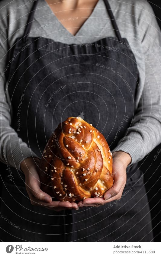 Woman showing homemade festive bread tradition food decoration fresh meal woman bake celebrate appetizing cook crust crunch crispy dough female housewife