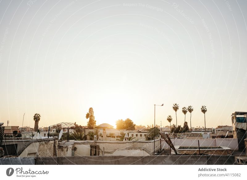 Ancient city with traditional architecture ancient old building house cityscape roof travel tourism stone street construction urban historic plant sky morning