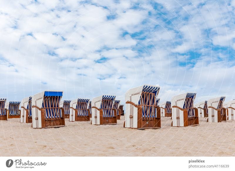 Deserted beach in Warnemünde Warnemuende Rostock Germany Baltic Sea Beach forsake sb./sth. Empty Lonely Beach chair Closed locked corona COVID covid 19 Risk