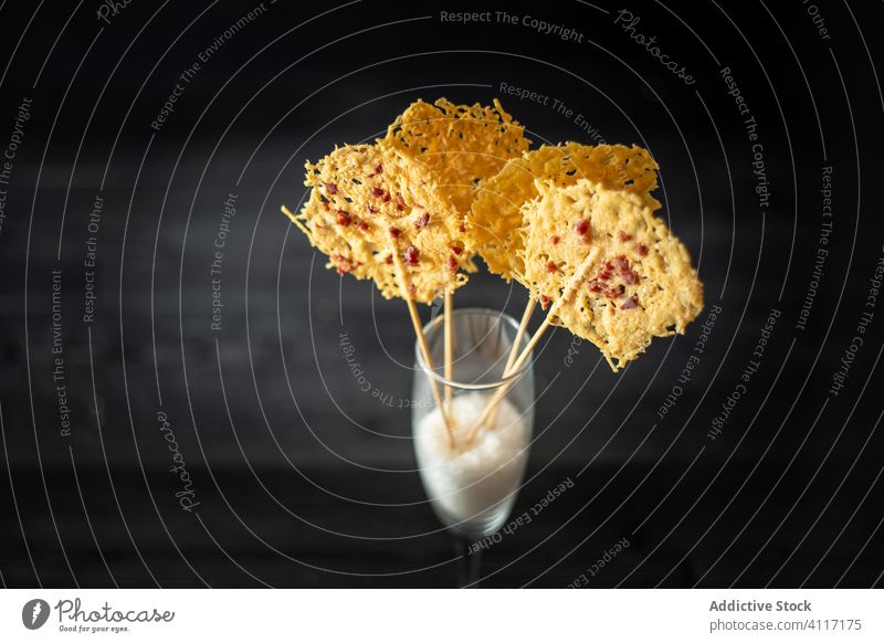 Cheese chips in champagne glass cheese grate appetizer cafe decor stick crunch yummy delicious crispy tasty sweet food rice beverage snack fresh treat baked
