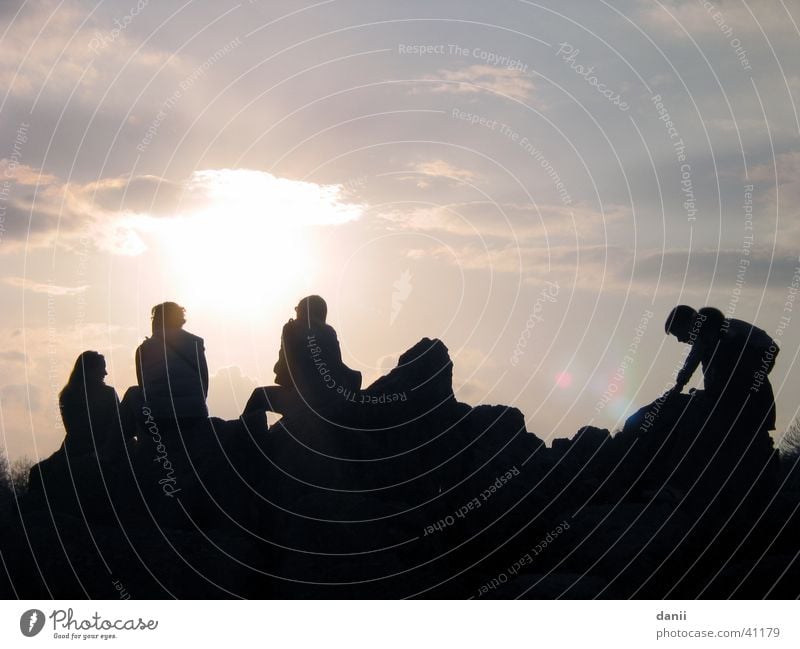 sit around Sunset Together Friendship Clouds Bad weather Group Evening Sit Human being