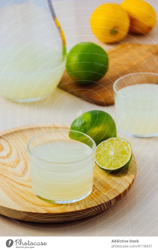 Delicious lemonade served in glasses homemade citrus fruit beverage drink refreshment cold delicious tasty liquid prepared sour vitamin appetizing slice whole