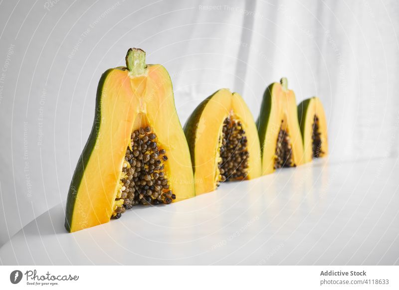 Pieces of ripe papaya on white background tropical piece seed fresh food slice fruit dessert cut healthy meal summer serve sweet snack vegetarian vegan diet