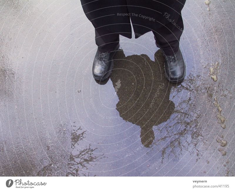 Black in the rain Reflection Rain Water Human being