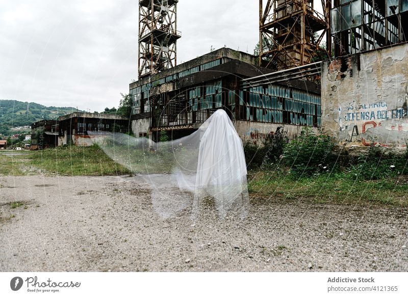 Ghost near abandoned industrial building ghost industry mine old construction grunge desolate destroy metal shabby rust weathered damage aged structure ruin