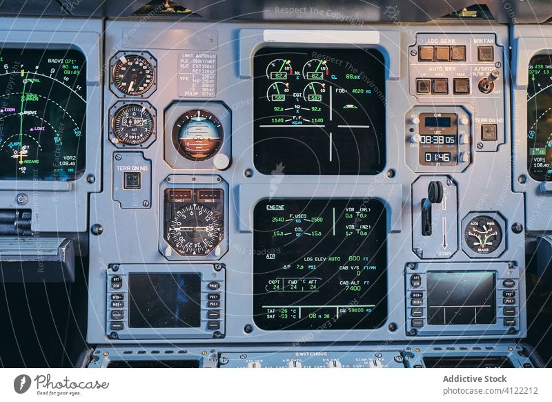 Fire buttons on control panel in cockpit aircraft fire warning security safety equipment modern airplane aviation contemporary transport technology flight