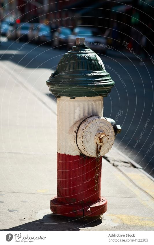 Fire hydrant on city street fire equipment old emergency pavement new york usa road america retro vintage aged metal urban pedestrian sidewalk tourism travel