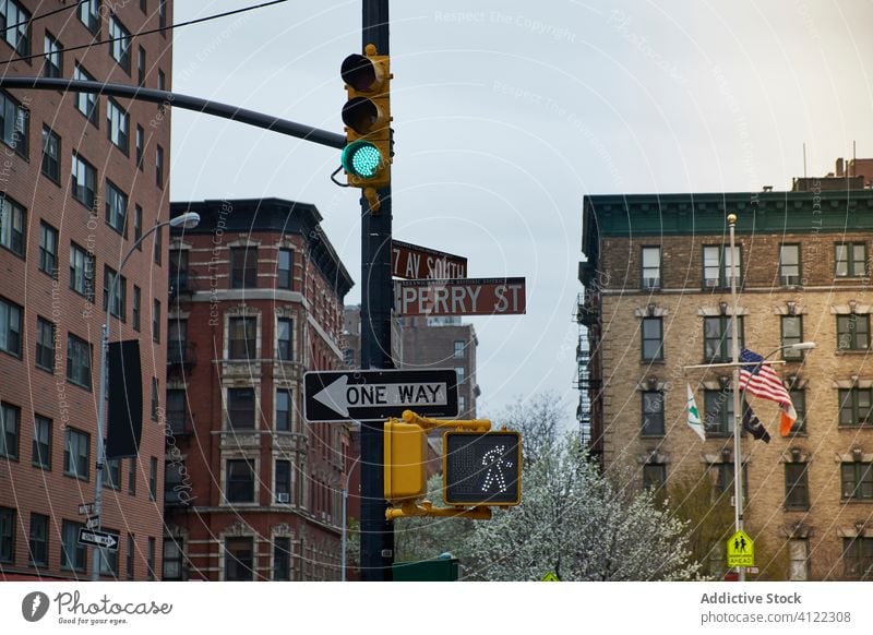 Traffic signs on street of city district traffic road signpost crossroad crosswalk building old weathered new york usa america architecture urban symbol