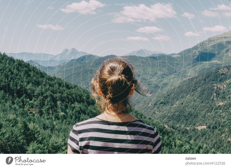 Girl walking along a small path in the mountain Spain. spain outdoor medium copy space color people female one person 20s 30s freedom girl travel woman