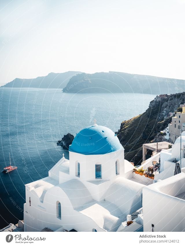 Breathtaking scenery of sea shore in Santorini seashore landscape house blue white cliff rocky greece santorini coast island famous picturesque sky view travel