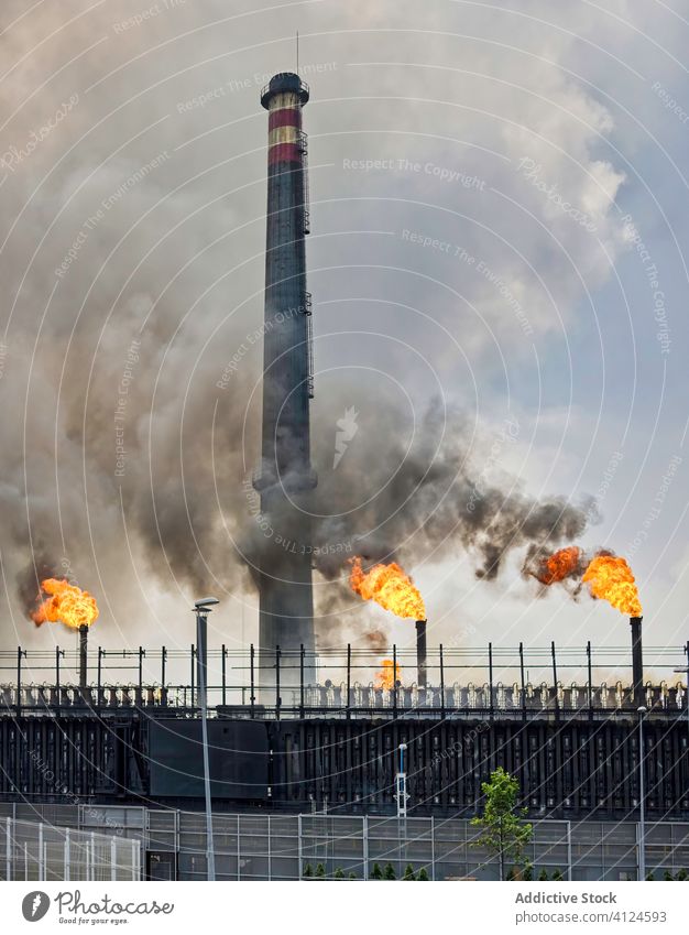 Exterior of coking plant with pipes and coke batteries coke battery industrial smoke factory flame building weathered aviles spain industry manufacture