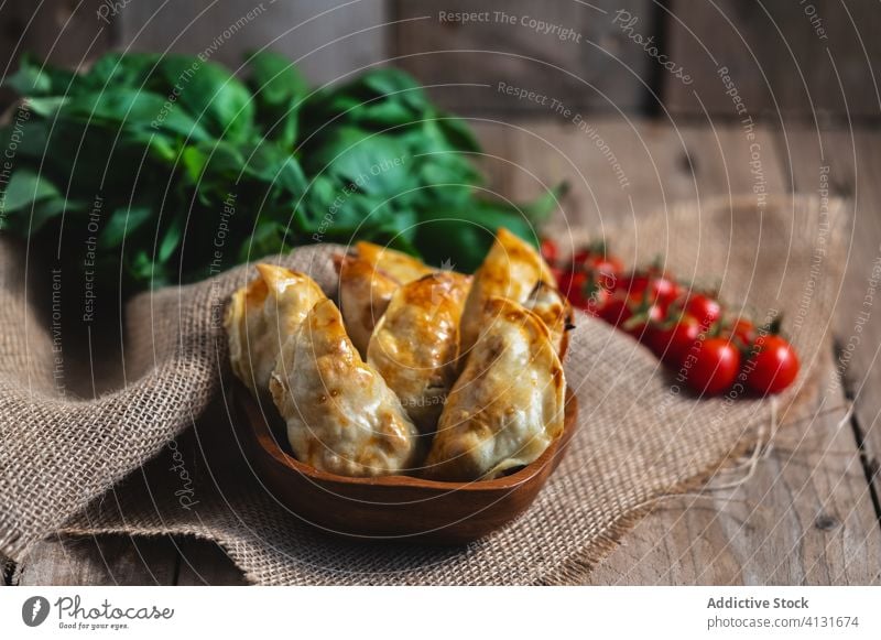 Delectable turnover pies with tomatoes and herbs pastry homemade food baked fill spinach tradition spanish appetizing tasty meal cuisine cook dish culinary