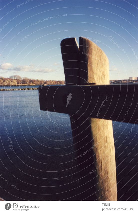 Post at the lake Lake Light Horizon Autumn Sunlight Pole footbridge Water Shadow