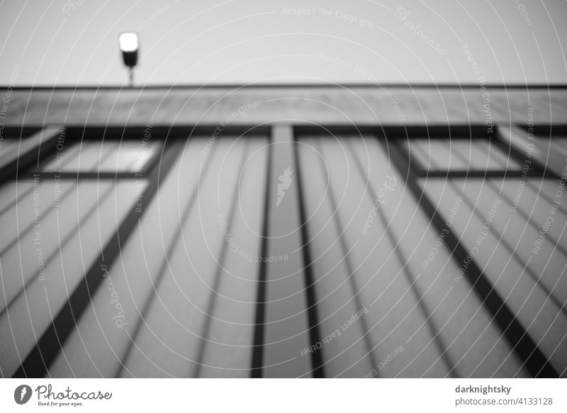 Wide angle shot of a facade made of glass and concrete with lighting Architecture Manmade structures Facade Exterior shot Town Day Wall (building)