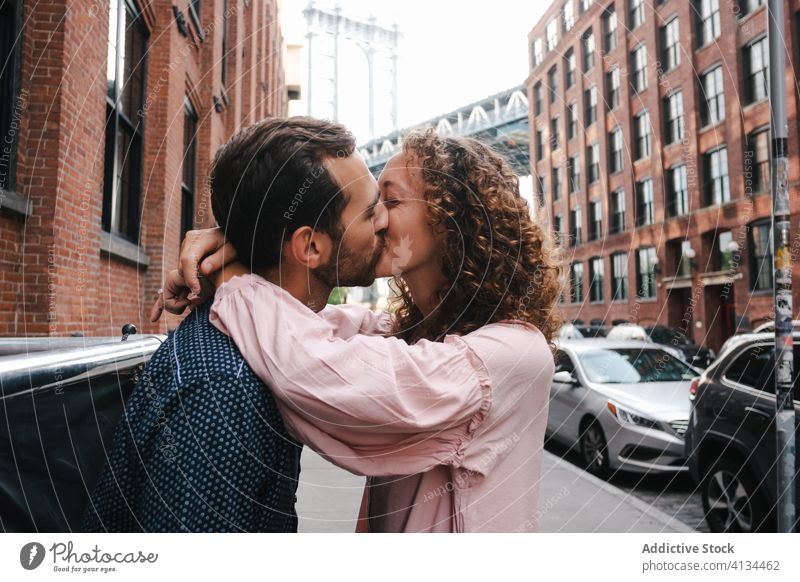 Tender couple kissing on street gentle embrace city walk stroll together relationship new york america united states usa girlfriend boyfriend smile hug romantic