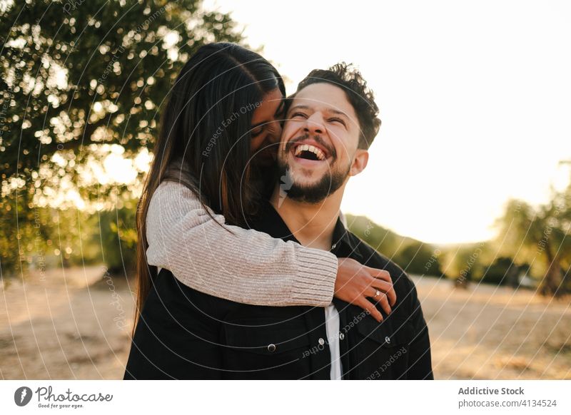 Loving couple hugging at sunset landscape spectacular love together relationship natural romantic embrace nature happy affection romance summer bonding date