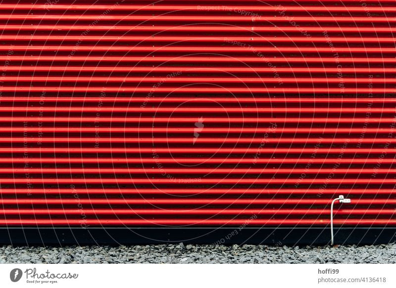 red striped facade with white grounding cable Red Striped Corrugated iron wall with red stripes Wall (building) red facade Facade Minimalistic