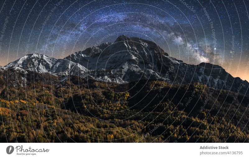 Night landscape with rocky mountain and Milky Way milky way night rough wild star dark sky nature scenic tranquil stone picturesque environment majestic extreme