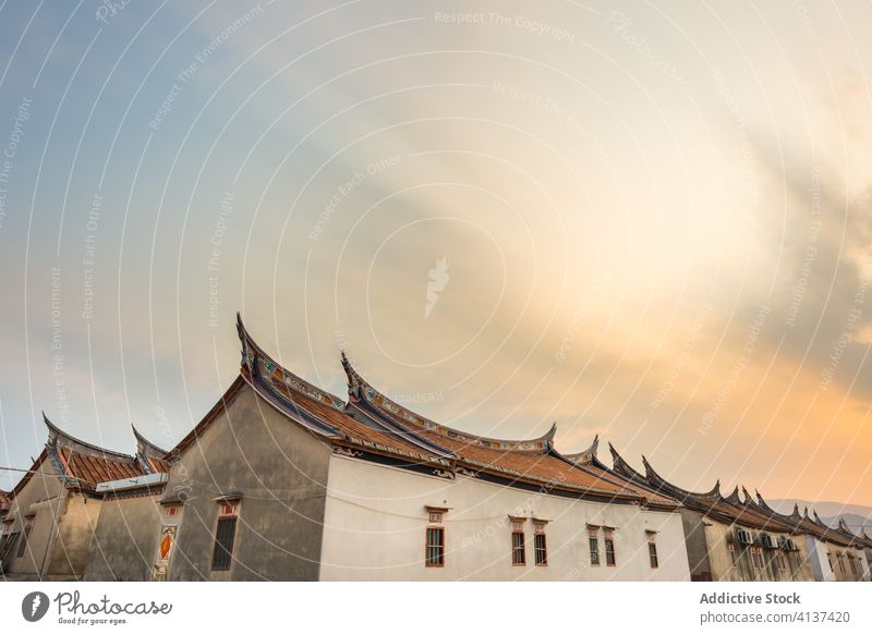 Old houses in village with ornamental roofs street stone old building tradition daimei china sunrise landmark architecture culture tourism historic travel