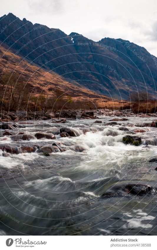 Mountain river among rough rocky terrain mountain stream landscape nature highland stone wild scotland glen coe tourism travel environment water scenery range