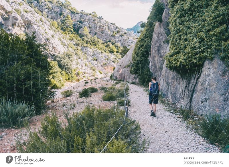 woman hiking on a mountain path in catalonia spain outdoor copy space color people female one person freedom travel healthy happiness success raised park