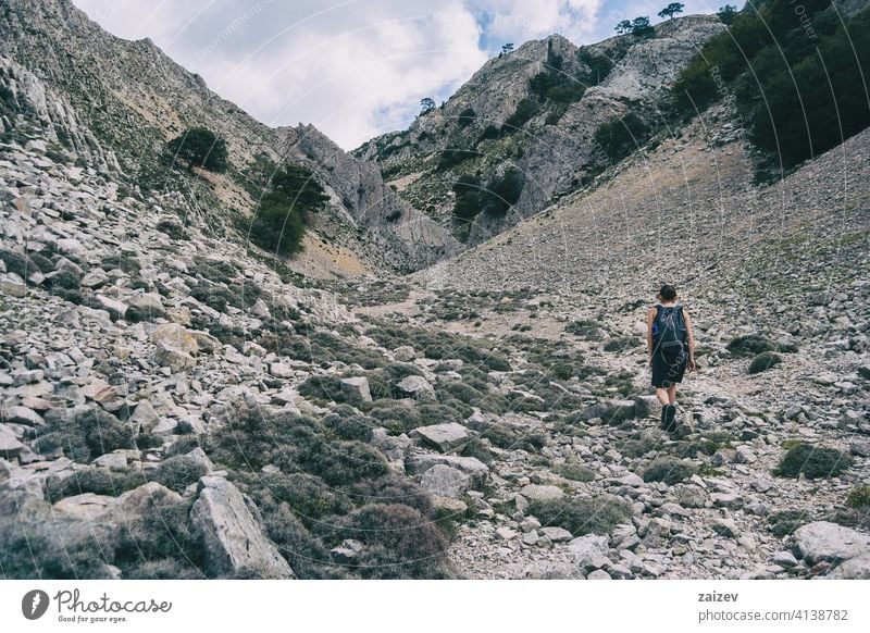 woman hiking on a mountain path in catalonia spain outdoor copy space color people female one person freedom travel healthy happiness success raised park