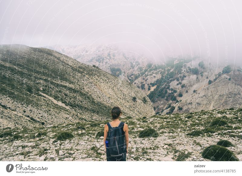 woman hiking on a mountain path in catalonia spain outdoor copy space color people female one person freedom travel healthy happiness success raised park