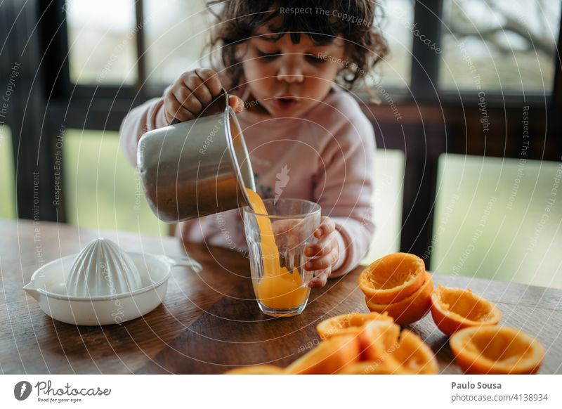 child making orange juice Child Orange Orange juice Juicy Juice Vitamin Organic produce Citrus fruits Colour photo Nutrition Fresh Food Vitamin C Fruit Healthy