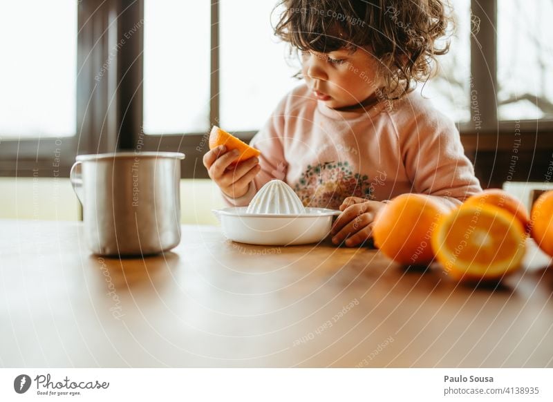 child making orange juice Child 1 - 3 years Authentic Orange Colour photo Day Joy Infancy Juicy Orange juice citrus Preparation Fruit Healthy Juice Food