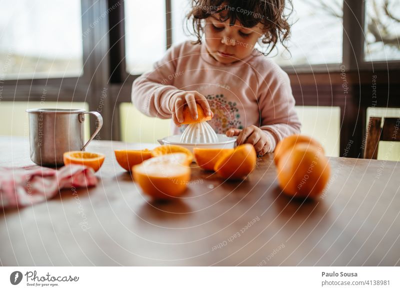 child making orange juice at home Child 1 - 3 years Caucasian Colour photo Authentic Orange Orange juice Preparation Fruit Human being Infancy Toddler childhood